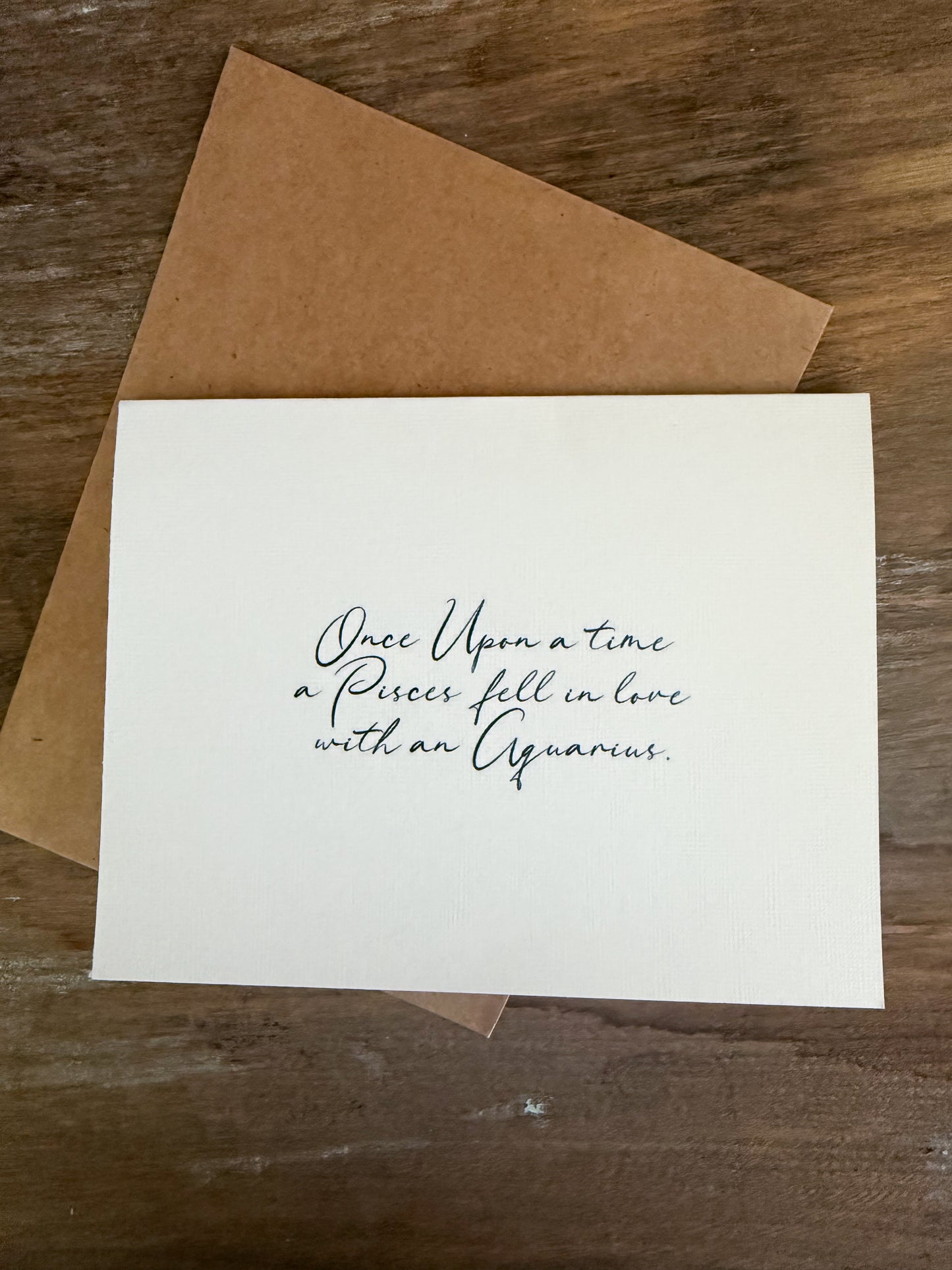 Pisces Loves Aquarius Greeting Card (Cursive)