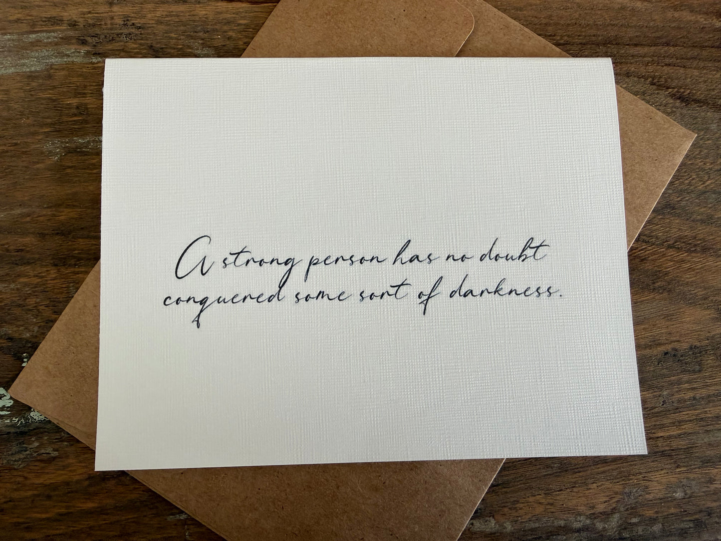 A Strong Person Has No Doubt Conquered Darkness Greeting Card