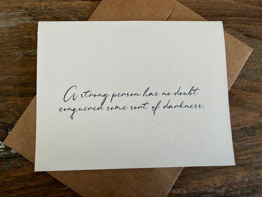 A Strong Person Has No Doubt Conquered Darkness Greeting Card